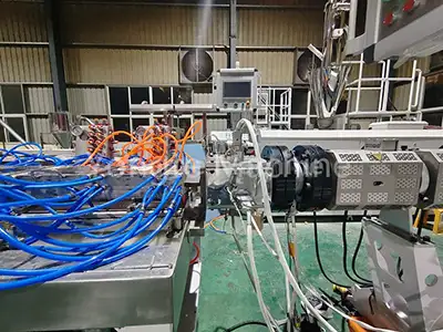 Recycled plastic lumber machine